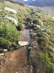 Quite often the trail was the path of least resistance  for the run off that would form a stream and run into a lake