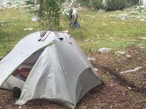 Tent with channel dug around to direct water