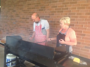 Don and Susan cooking up some burgers for the kids