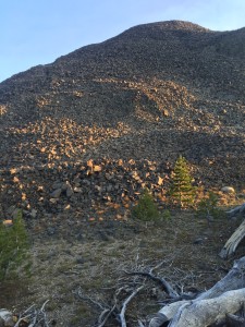 Walking a long a mountain of lava rocks